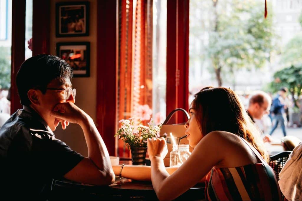 A man and woman seriously talking