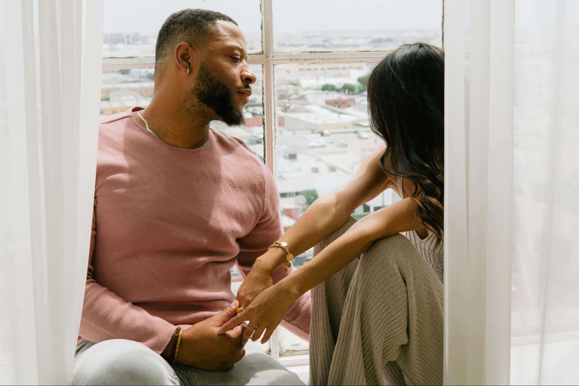 A man looking at the woman
