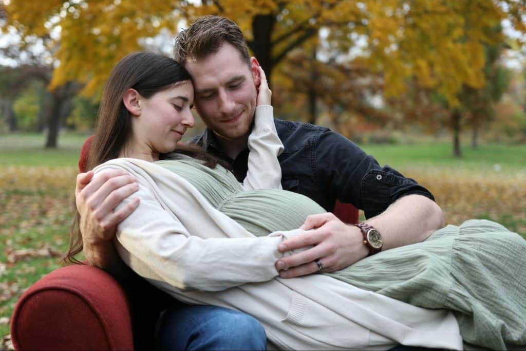 A man and woman embracing each other