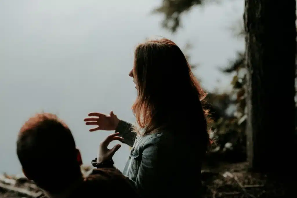A man and woman talking