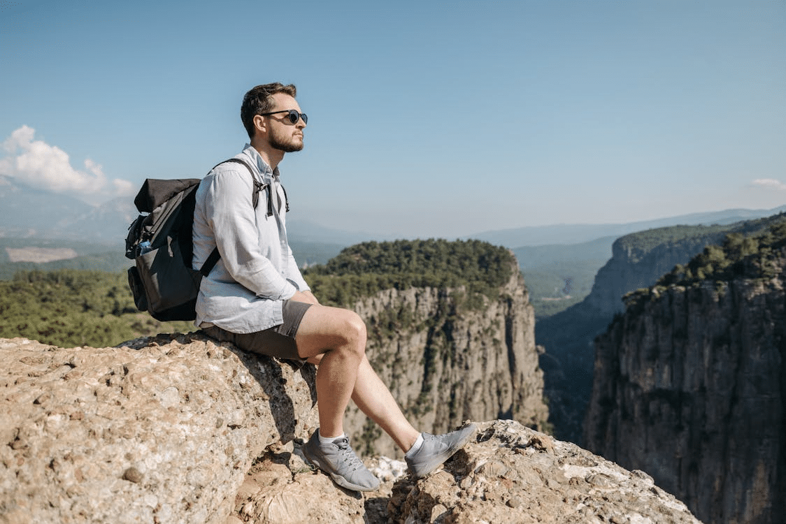 A man sitting on a rock