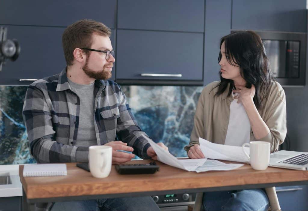 A man and woman talking