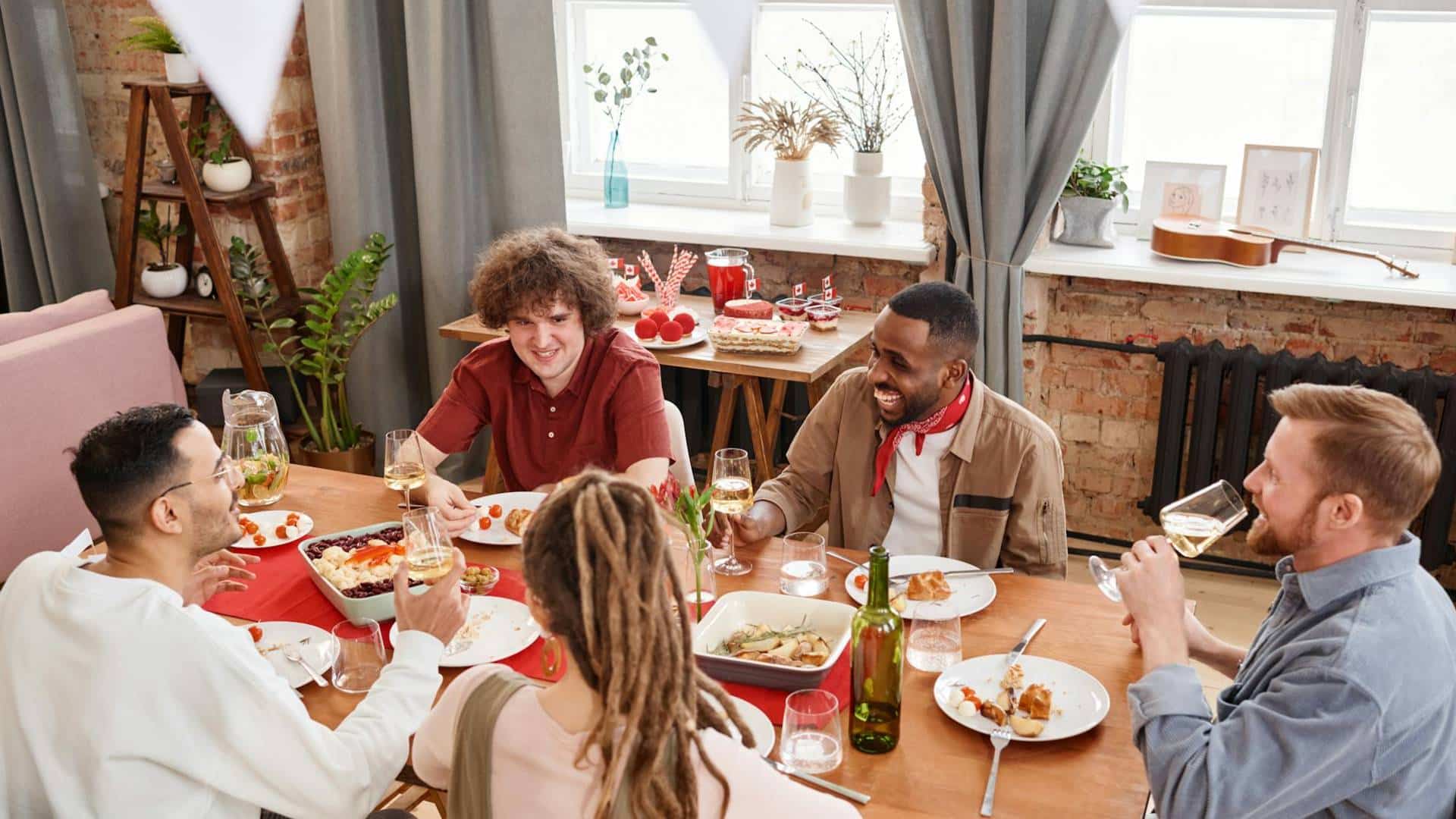 A group of friends having a meal together.