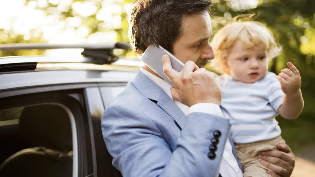 A busy dad on the phone