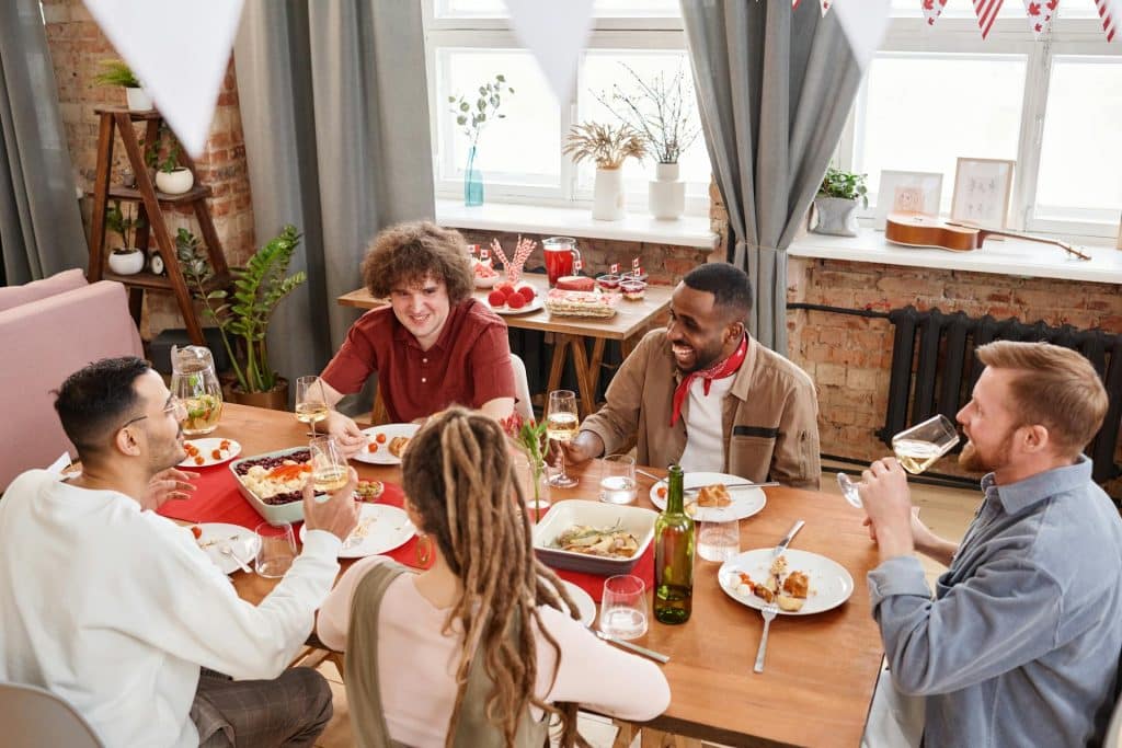 A group of friends having a meal together.
