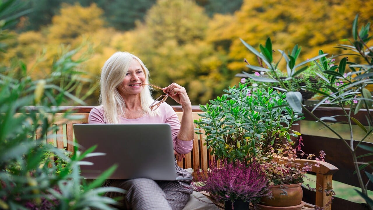 A mature woman using her laptop
