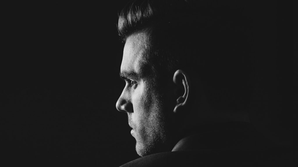 A man staring to the side.