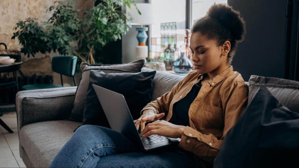 A woman planning by using her laptop