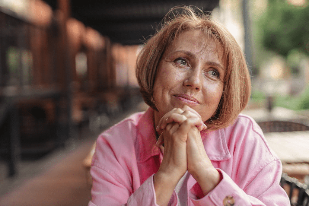A woman in a pink jacket