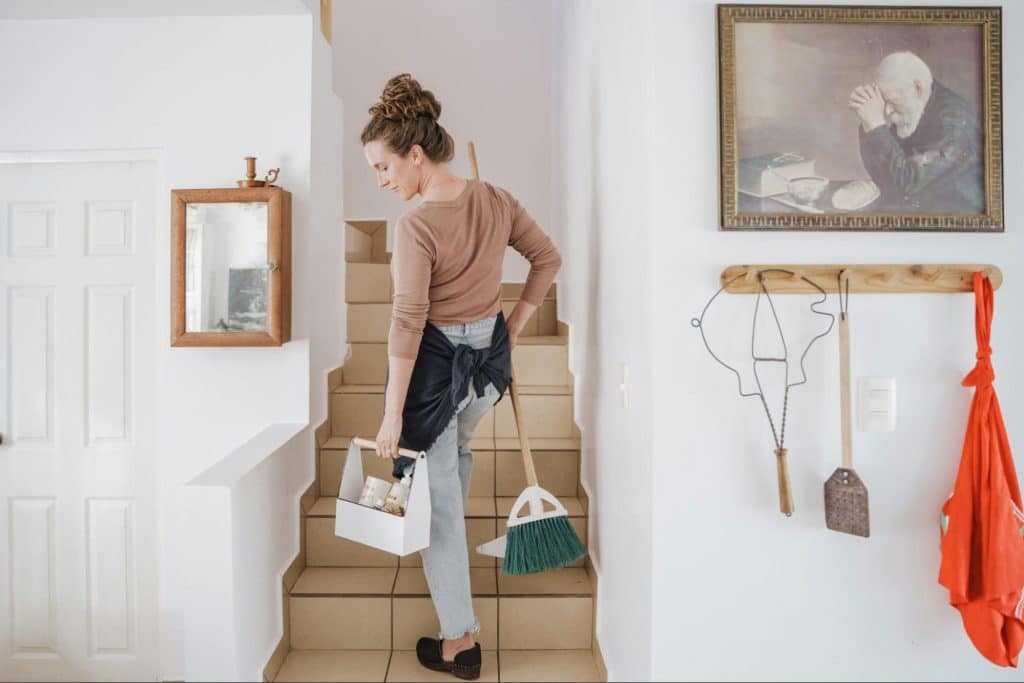 A woman cleaning the house