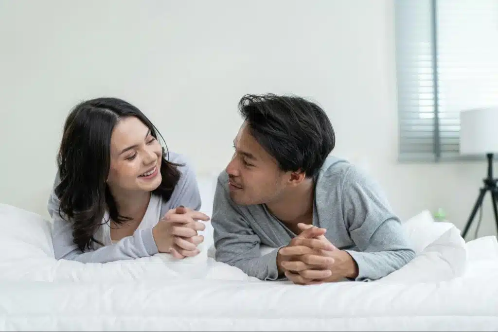 A man and woman looking at each other