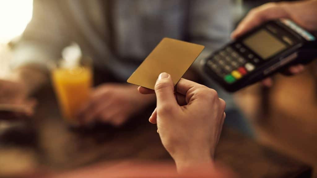 A person paying for the restaurant bill
