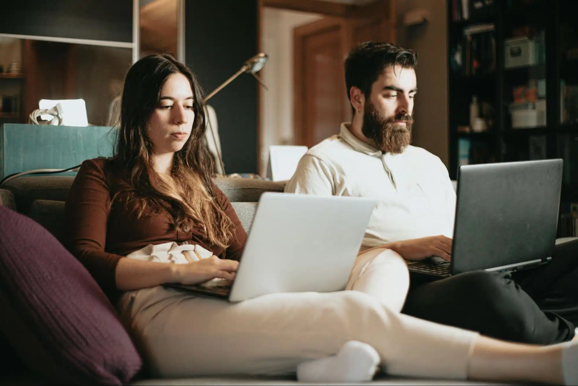 A man and woman busy working