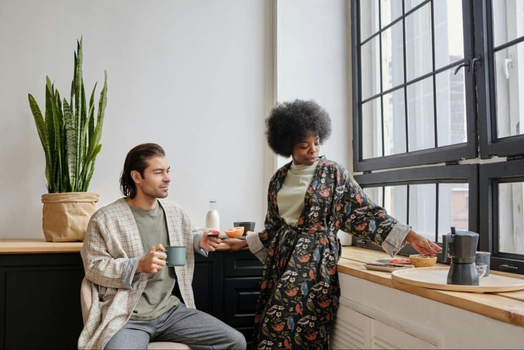 A man and woman having a coffee
