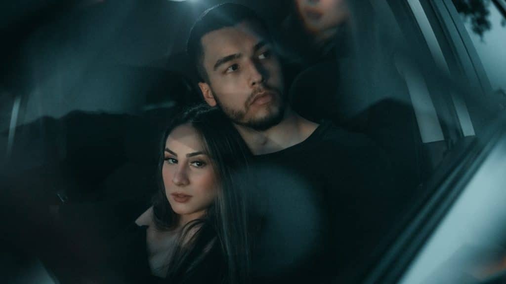 A man and woman in a car.