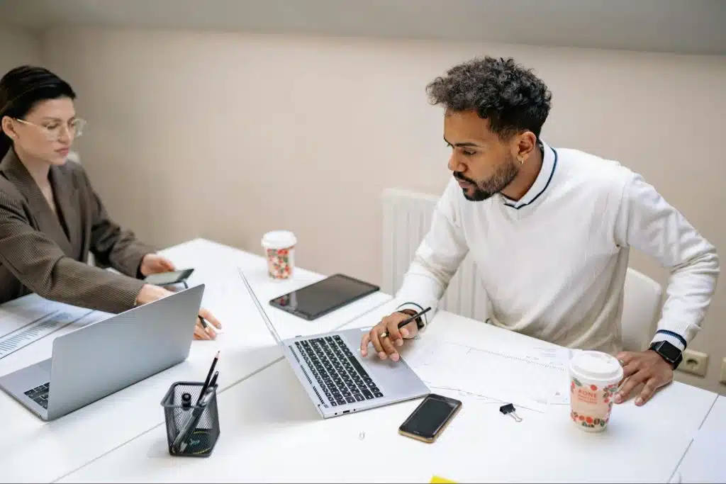 A man and woman busy working