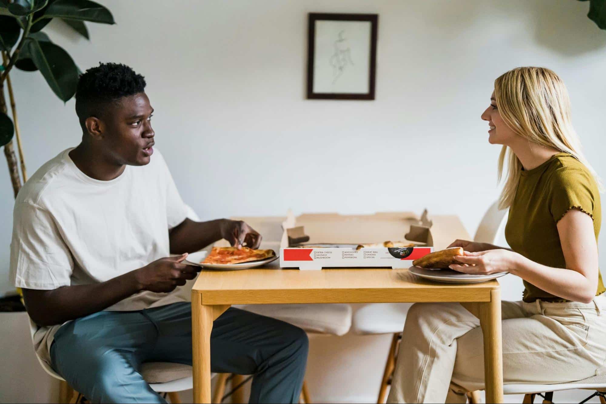 A man and woman at the dining table 