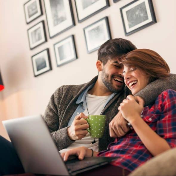 A man and woman on the couch