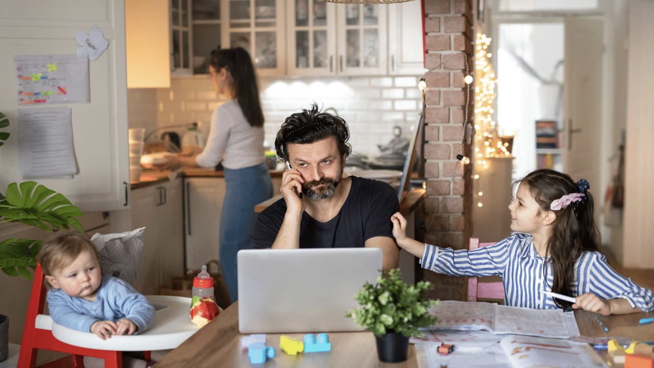 A dad busy at home