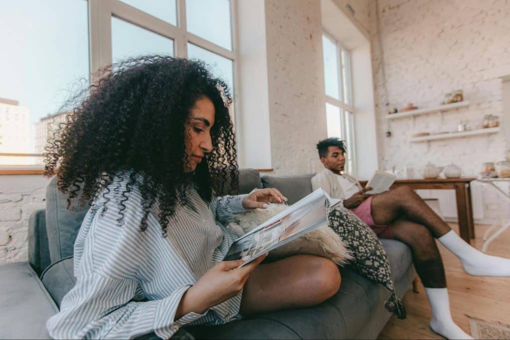 A man and woman at the living room does not have any connections at all