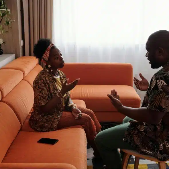 A man and woman arguing