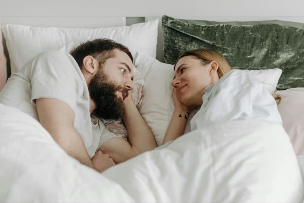 A man and woman looking at each other