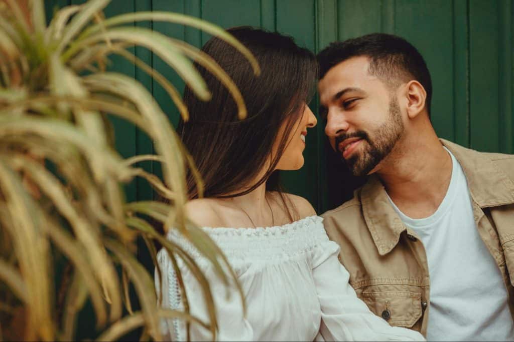 A man looking at the woman