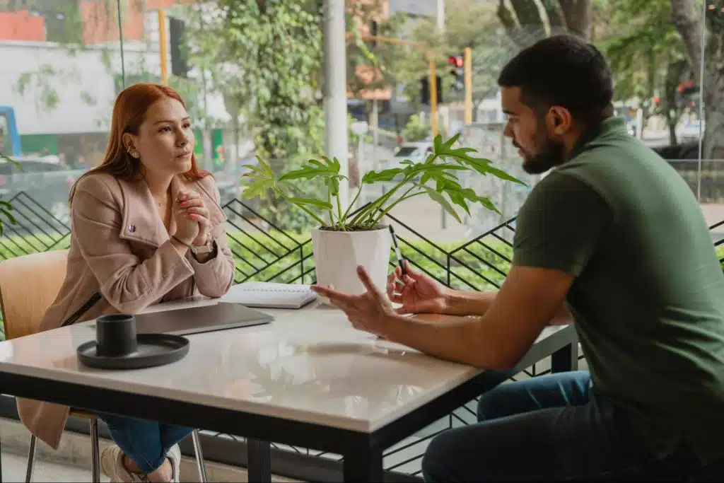 A man and woman talking