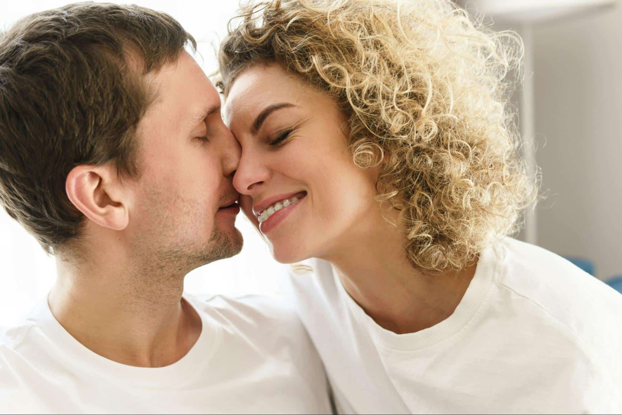 A man and woman close to each other