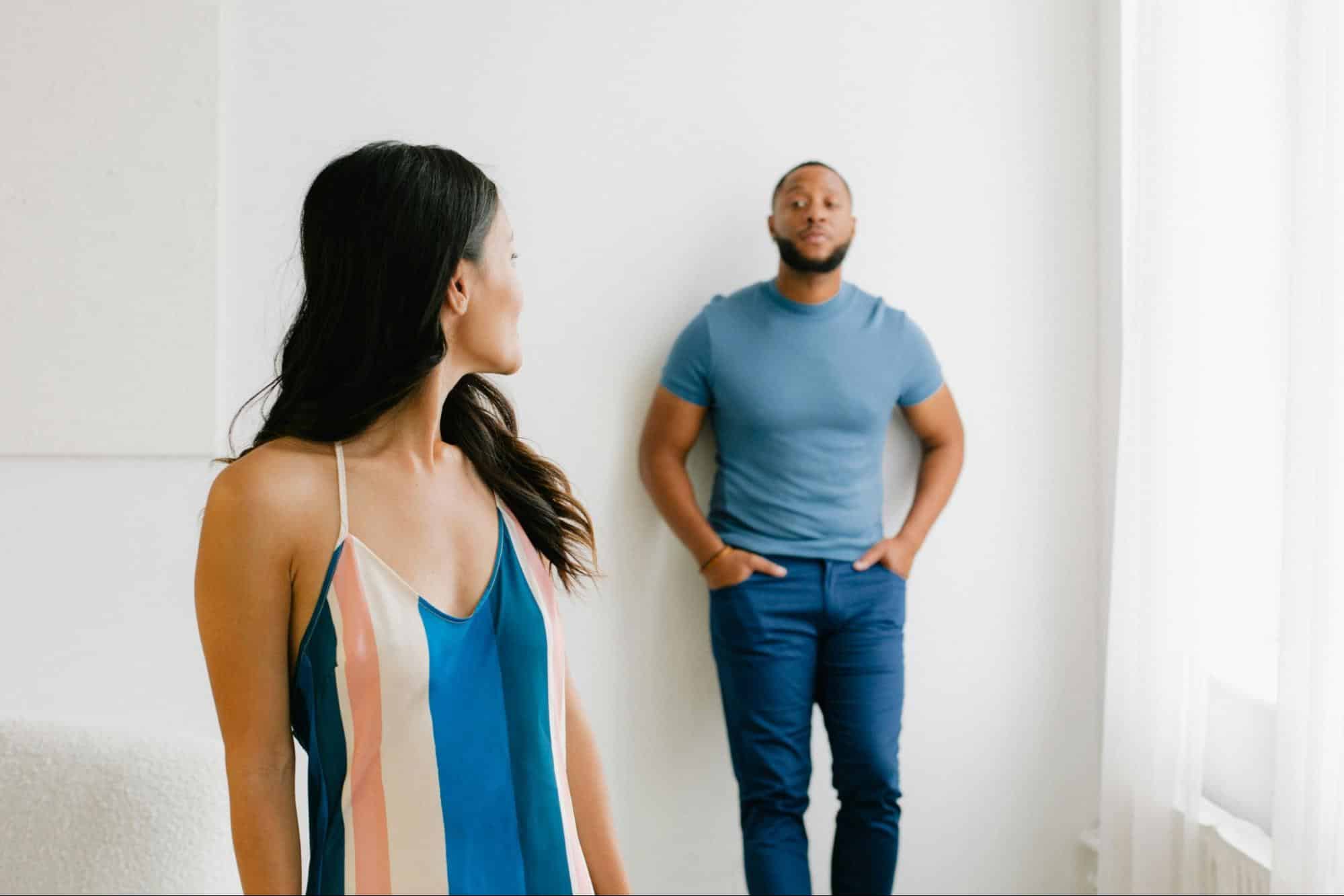 A man looking at the woman 