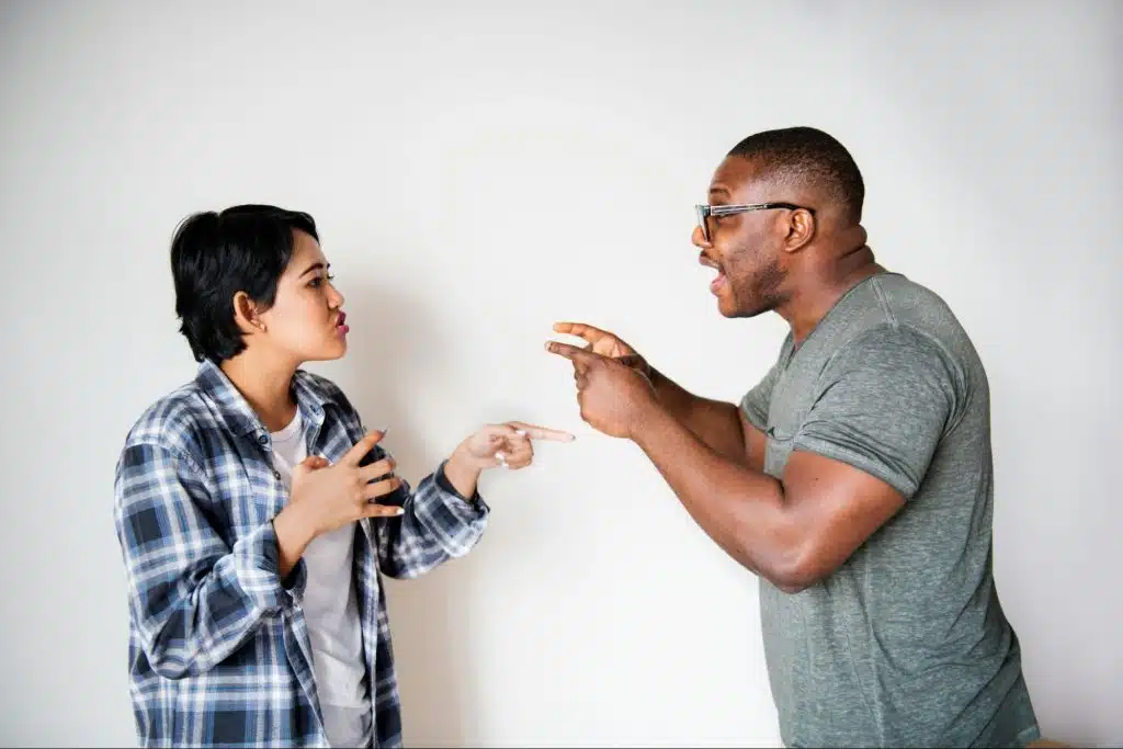A man and woman arguing