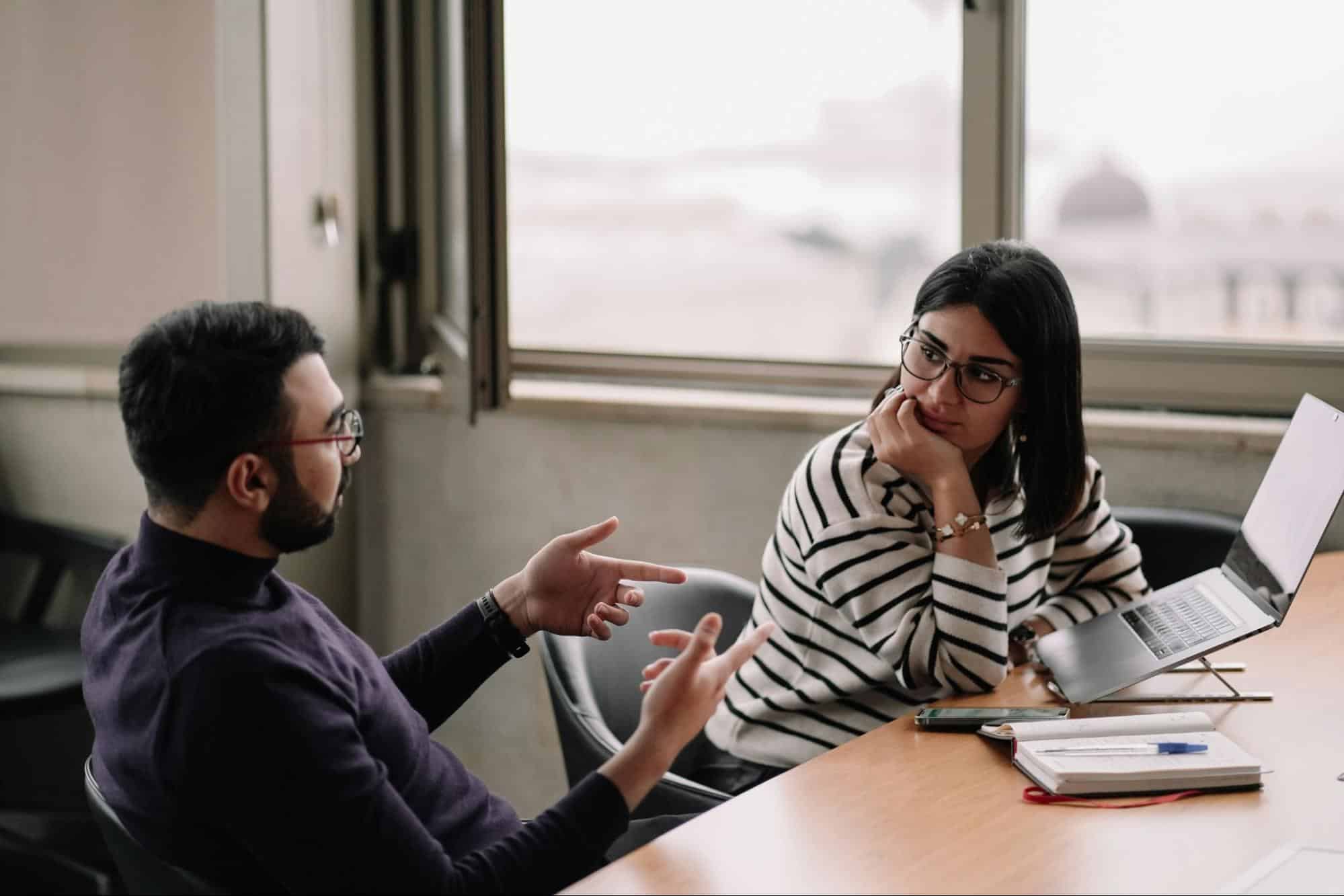 A man and woman having a conversation