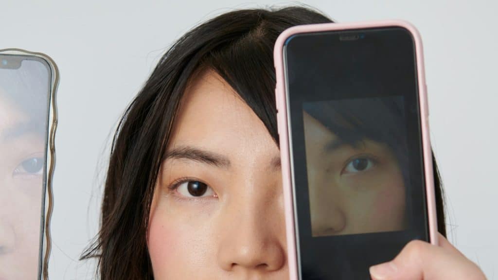 Pictures of a woman on a cellphone.