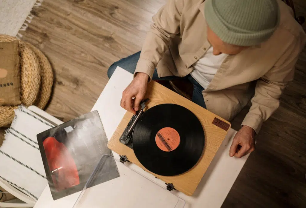 A man holding a vinyl record
