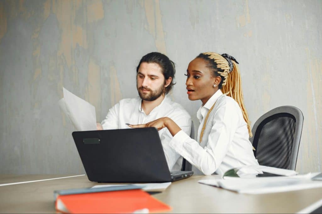 A man listening to a woman