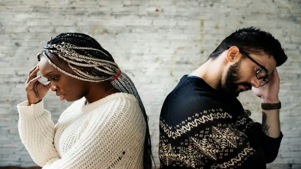 A couple ignoring each other