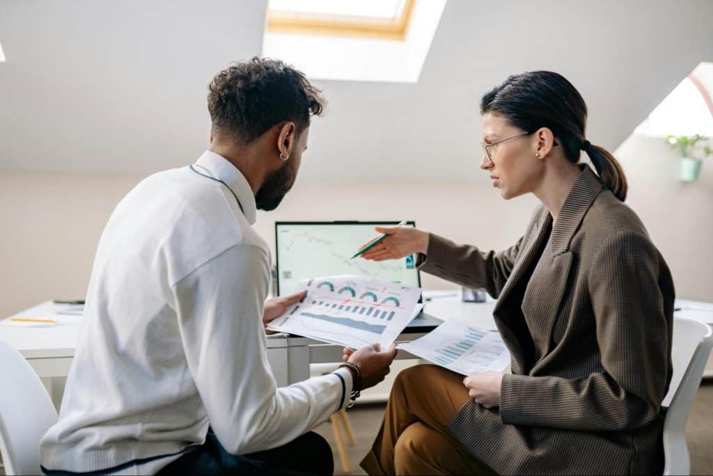 A man helping a woman