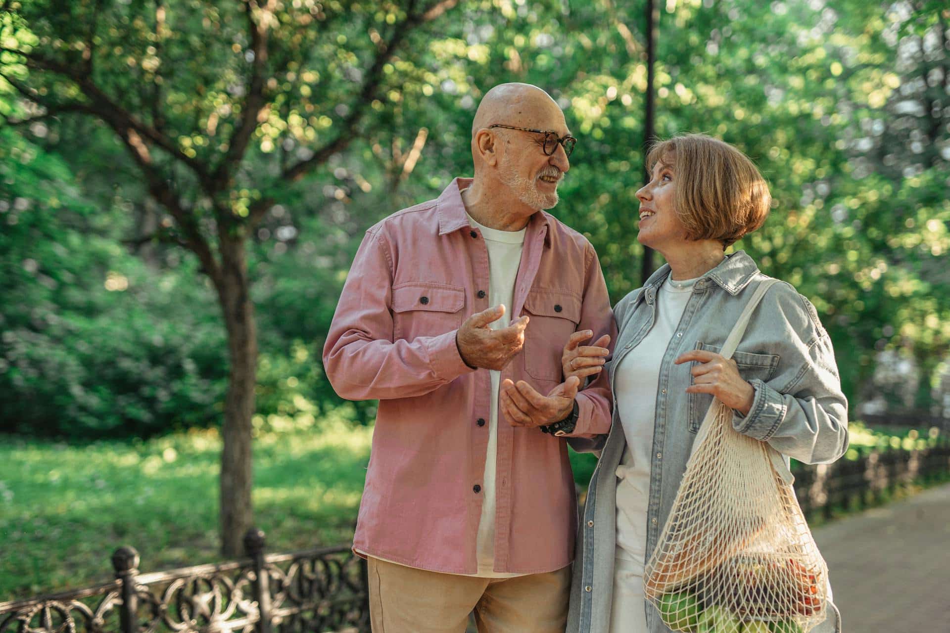 An elderly couple talking.