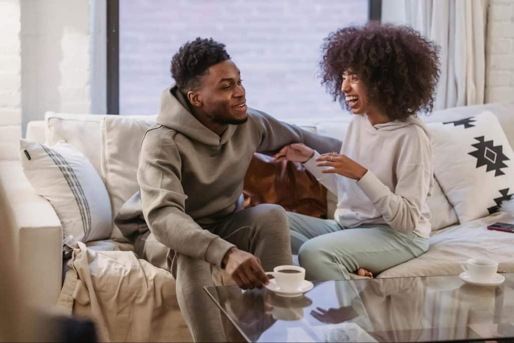 A man and woman talking