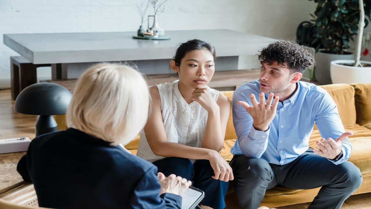 A couple arguing while in therapy