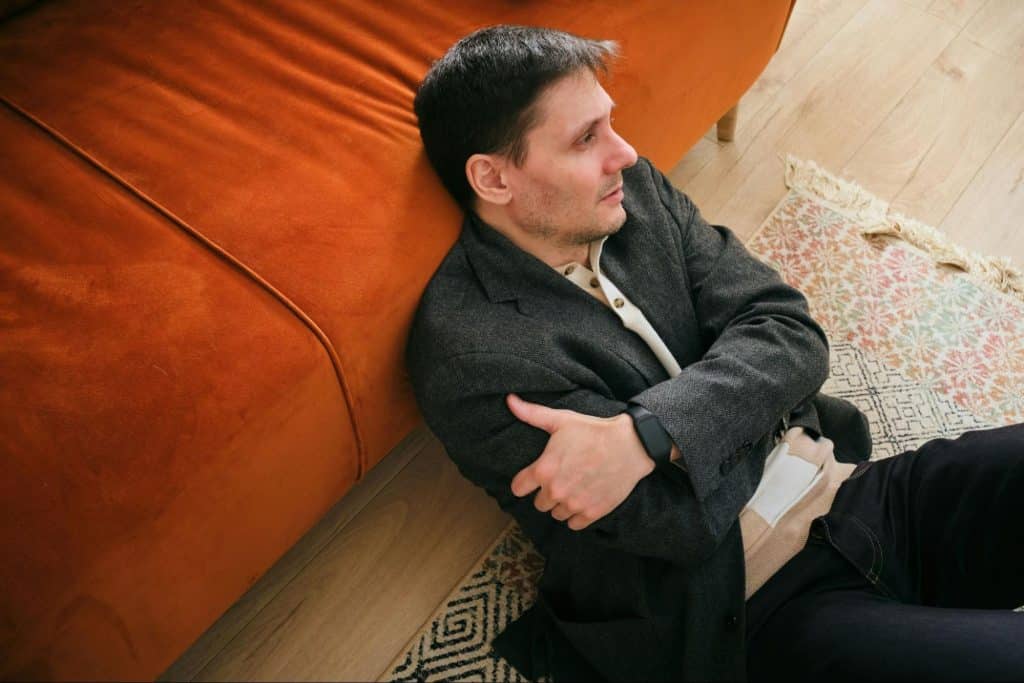 A man sitting at the floor