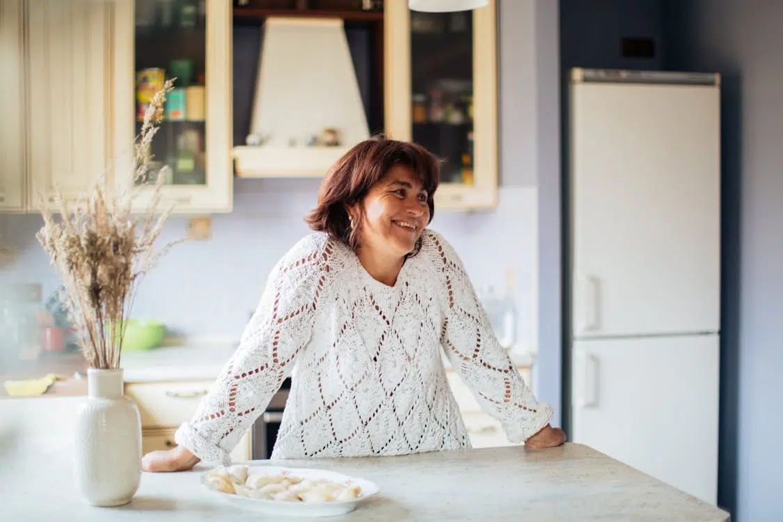 A woman smiling