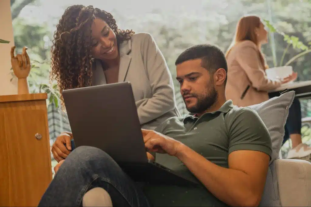 A woman trying to have a conversation with a busy man