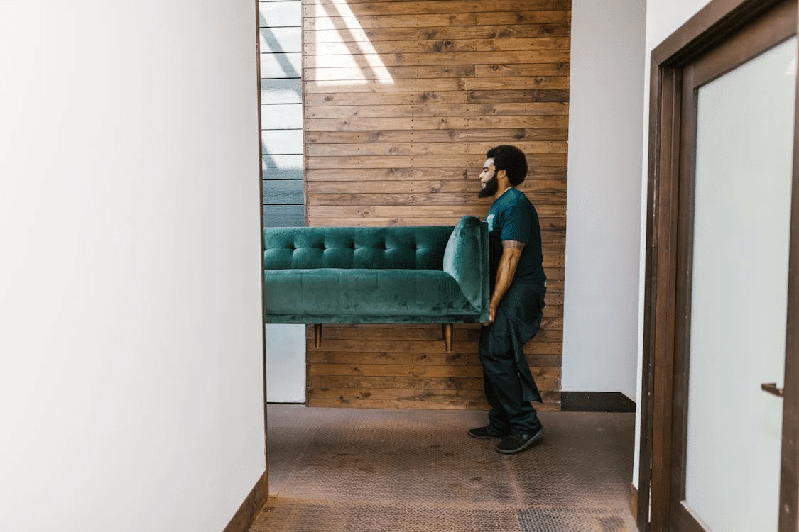 A man moving a furniture