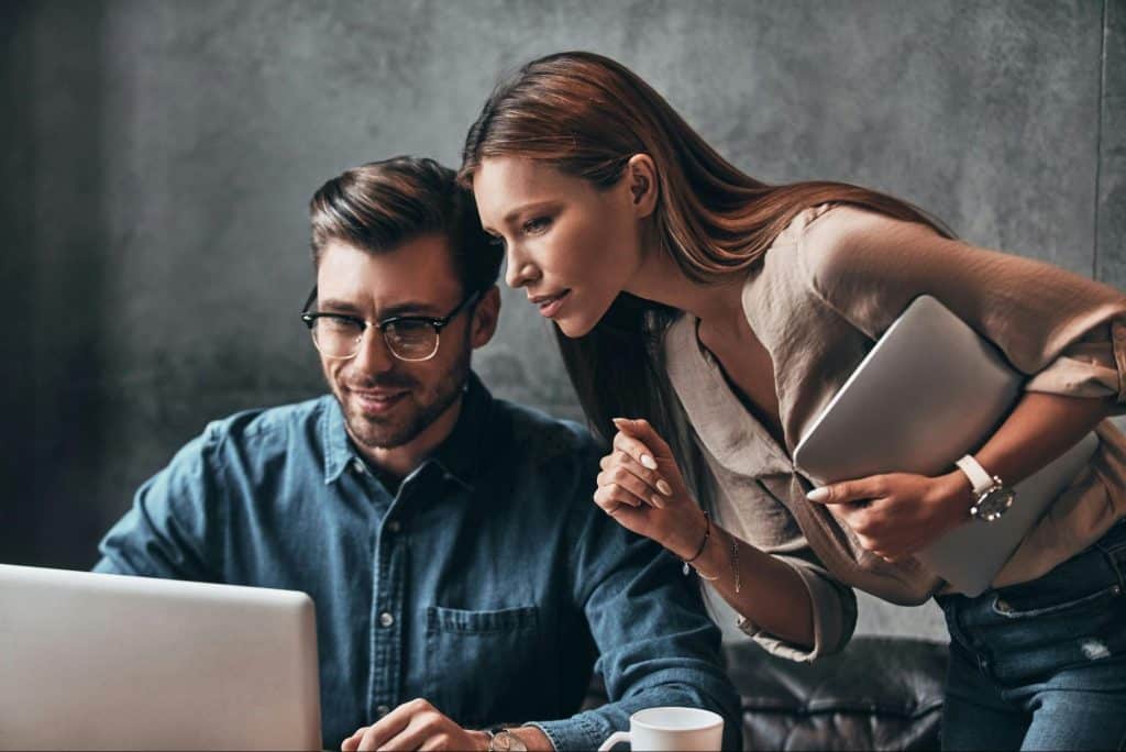 A woman trying to have conversation with a man