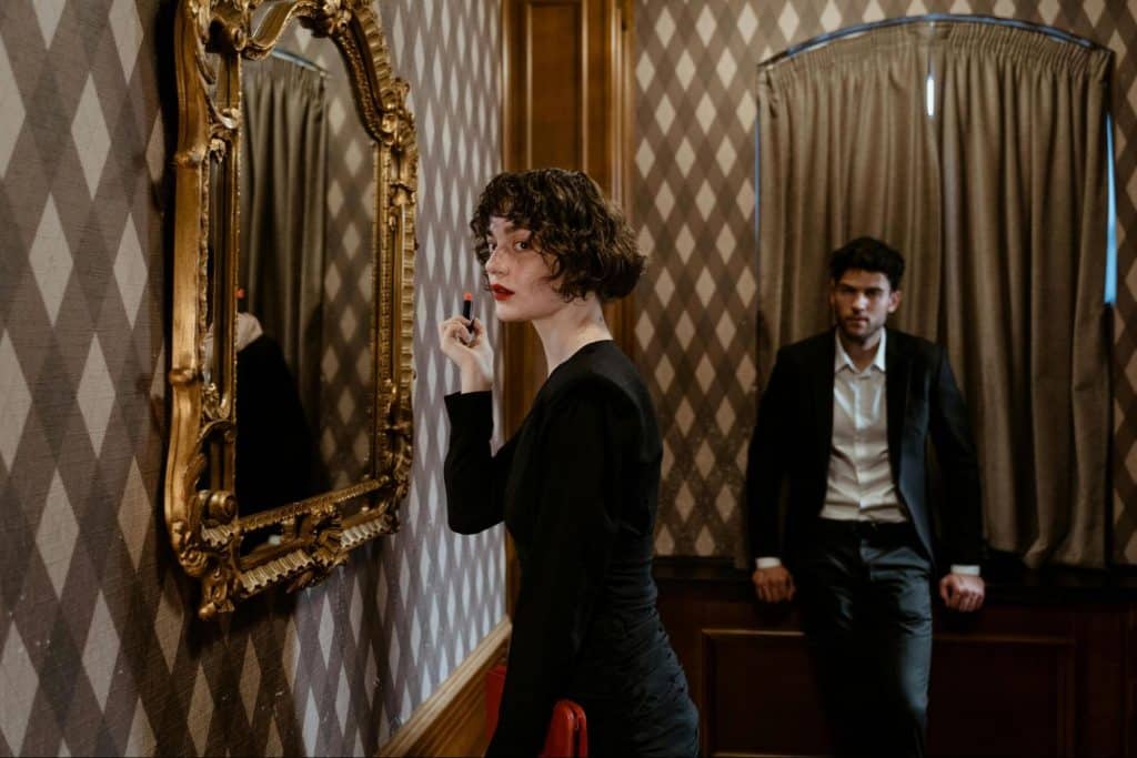 A man looking at the woman