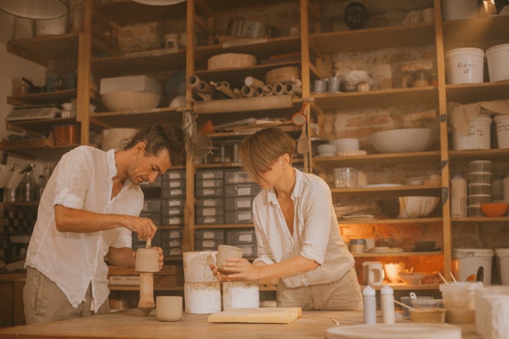 A couple doing pottery together