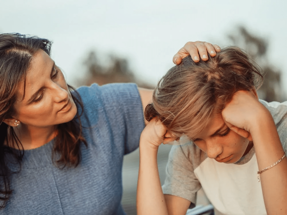 A mother comforting a child