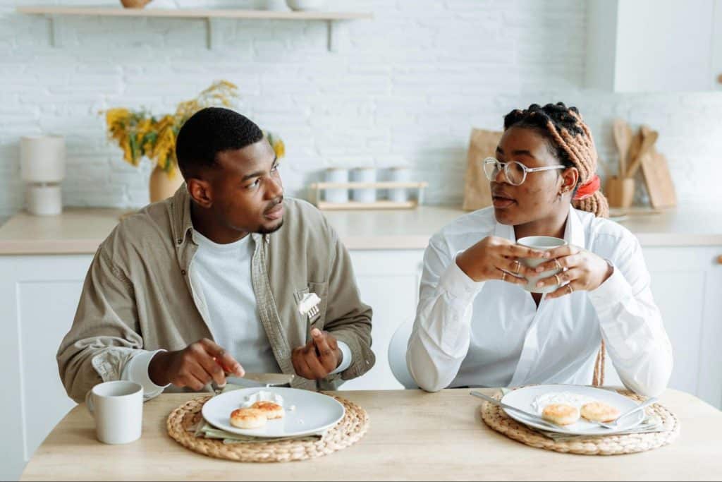A man asking something to woman