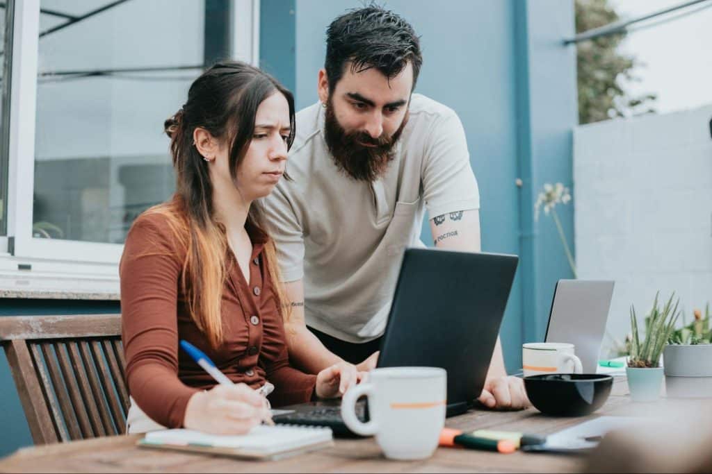 A man and woman looking serious together